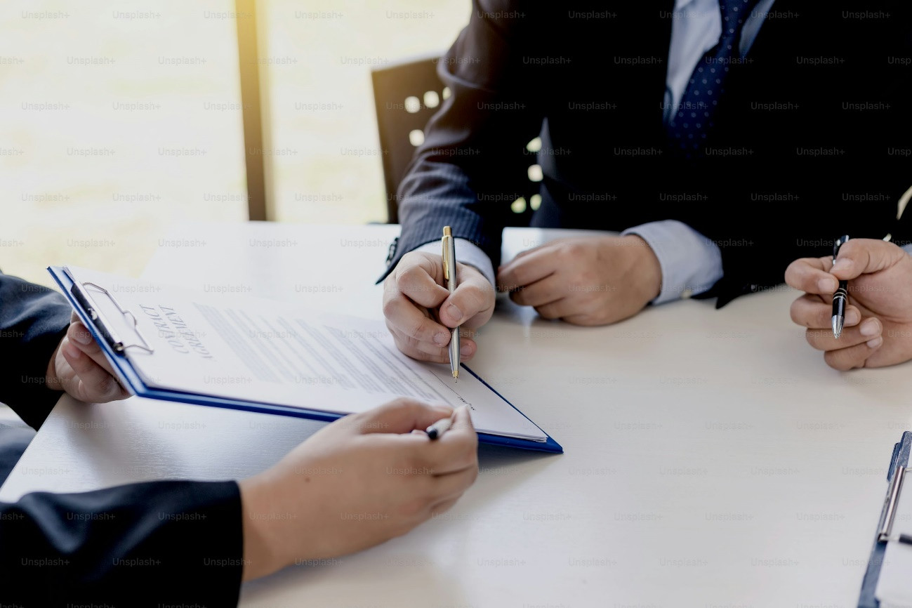 Imagen de una firma de un contrato